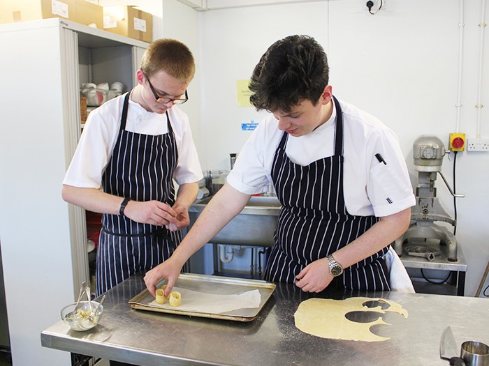 Students practise their cook and serve 